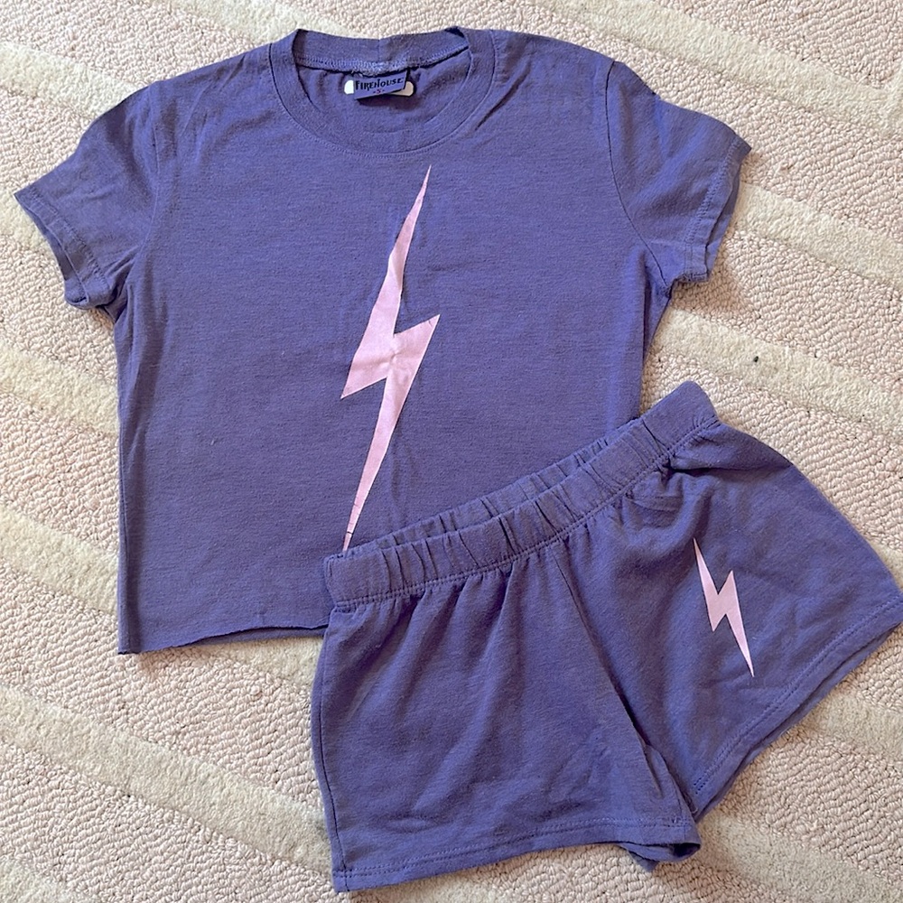 Girl’s lightning bolt shirt and shorts set in hot purple